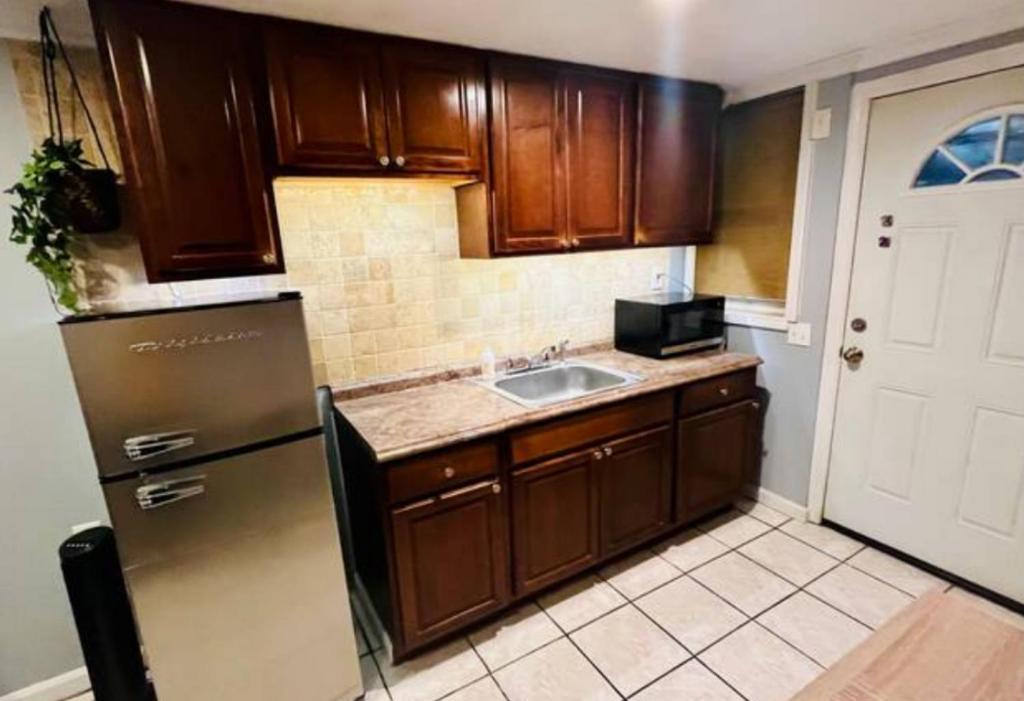 Kuchyň nebo kuchyňský kout v ubytování Cozy Apartments close to New York City