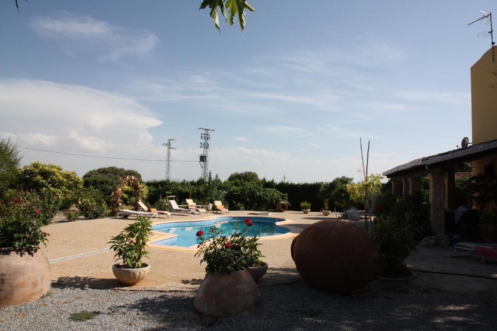 Bazén v ubytování Villa Rural Paquete nebo v jeho okolí