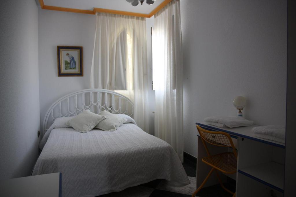 Postel nebo postele na pokoji v ubytování Villa Rural Paquete