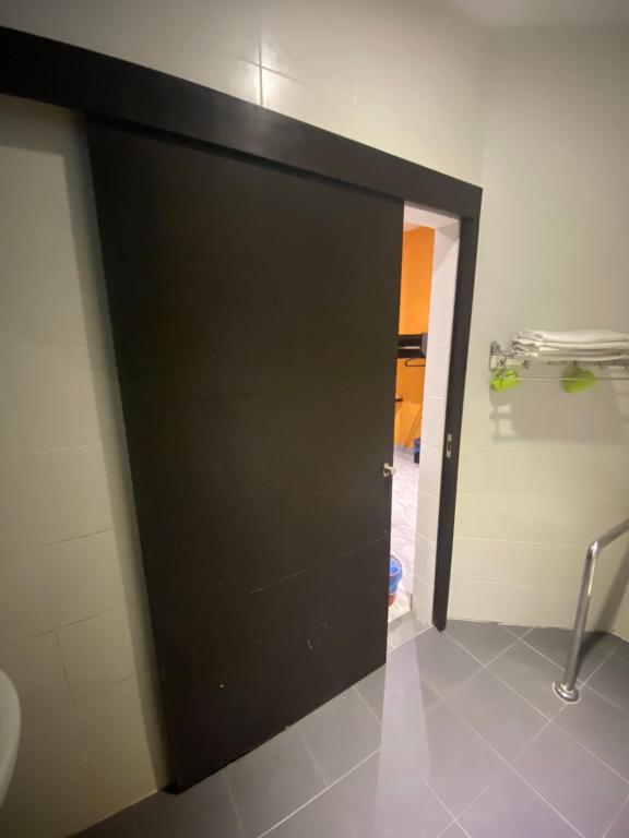 Koupelna v ubytování Padungan Hotel