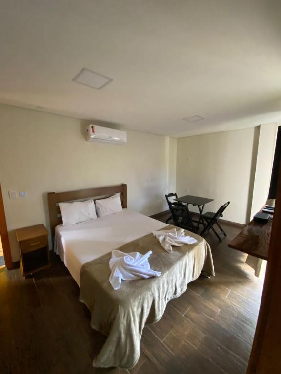 Postel nebo postele na pokoji v ubytování Trakai Suites