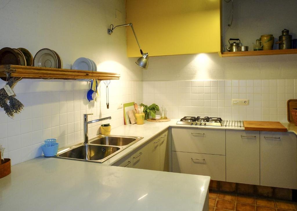 Una cocina o zona de cocina en Ca L'Olier