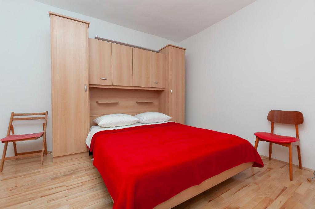 Posteľ alebo postele v izbe v ubytovaní Apartments Jasna