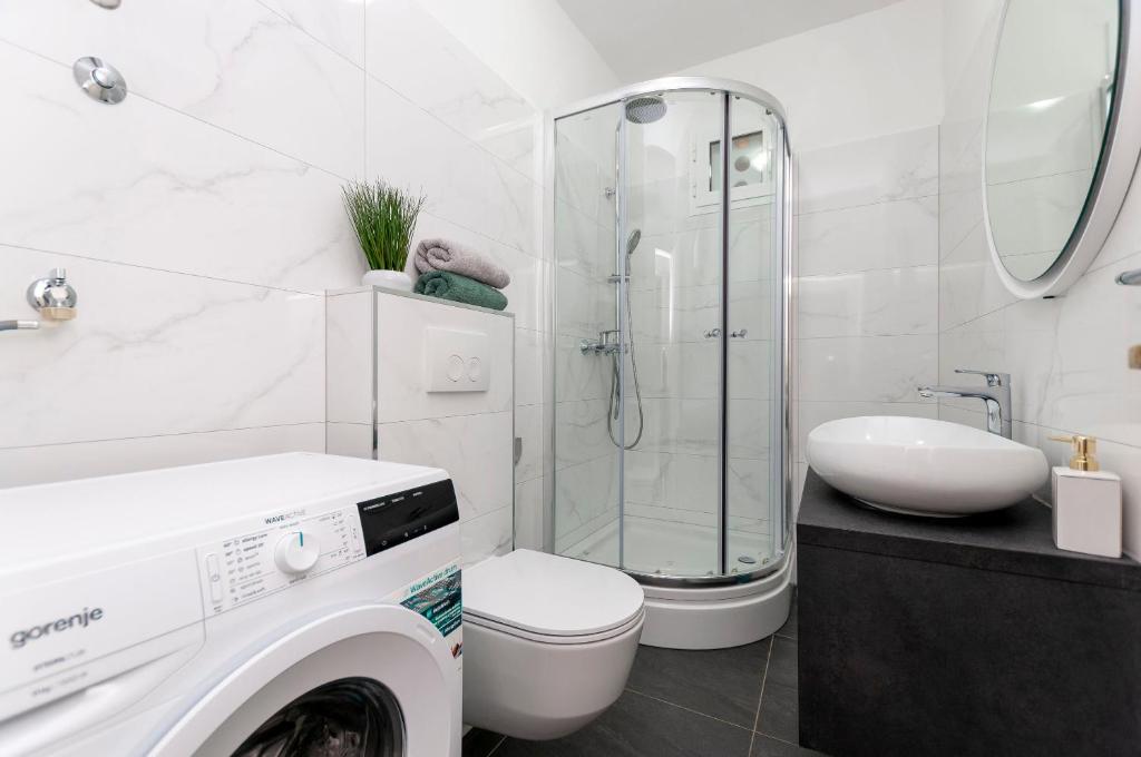 Kúpeľňa v ubytovaní Apartments Jasna