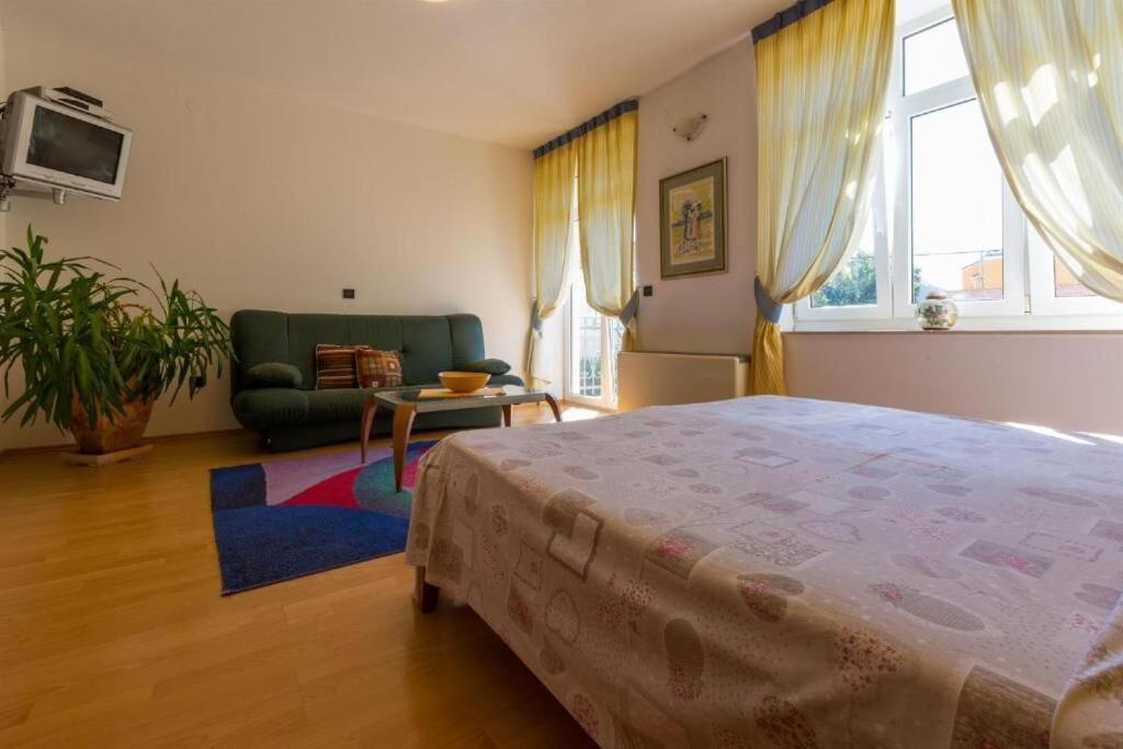 Posteľ alebo postele v izbe v ubytovaní Apartments Villa Katarina