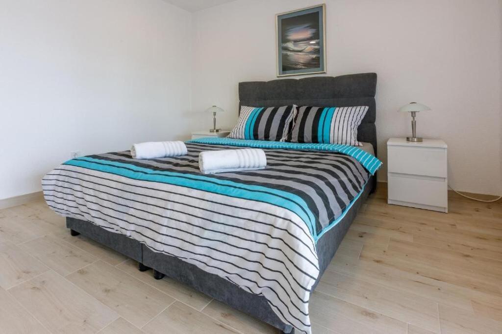 Postel nebo postele na pokoji v ubytování Apartments Cvetkovic