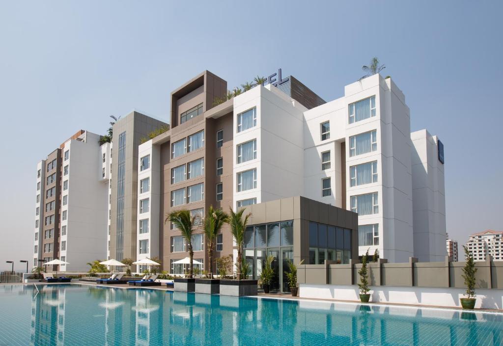 The swimming pool at or close to Novotel Yangon Max