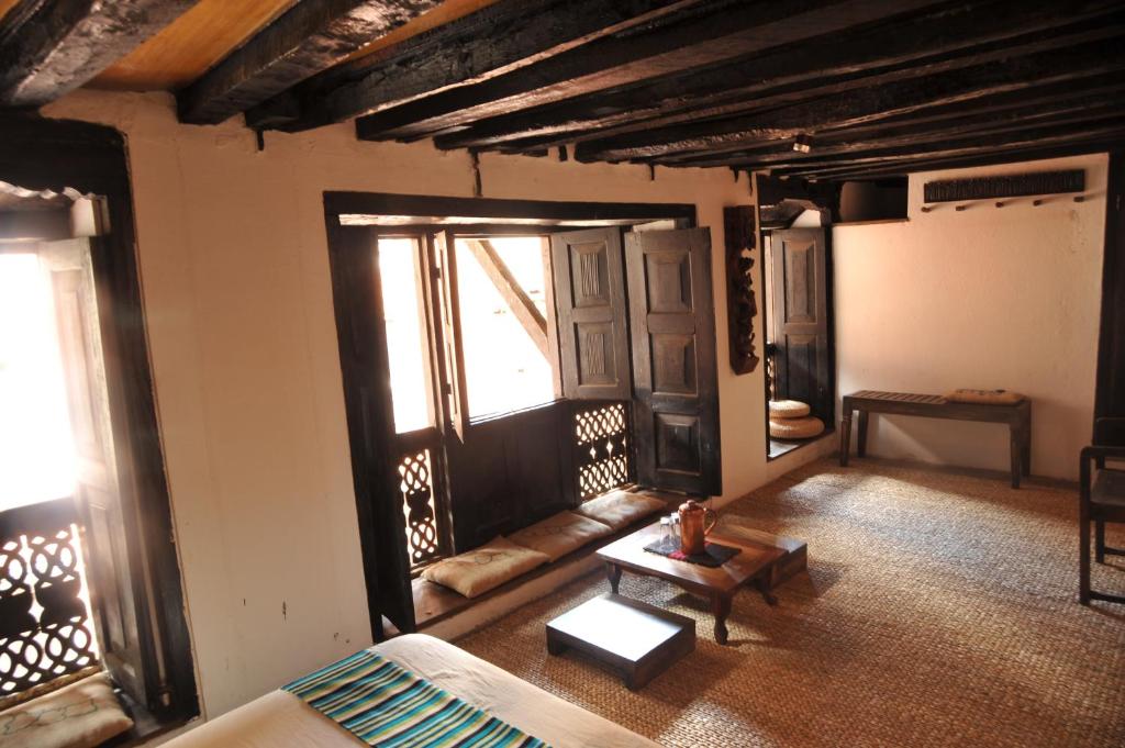 Posezení v ubytování Peacock Guest House