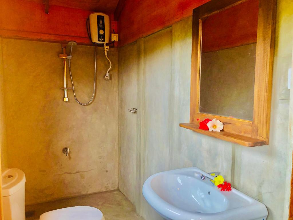 Koupelna v ubytování Sungreen Cottage Sigiriya