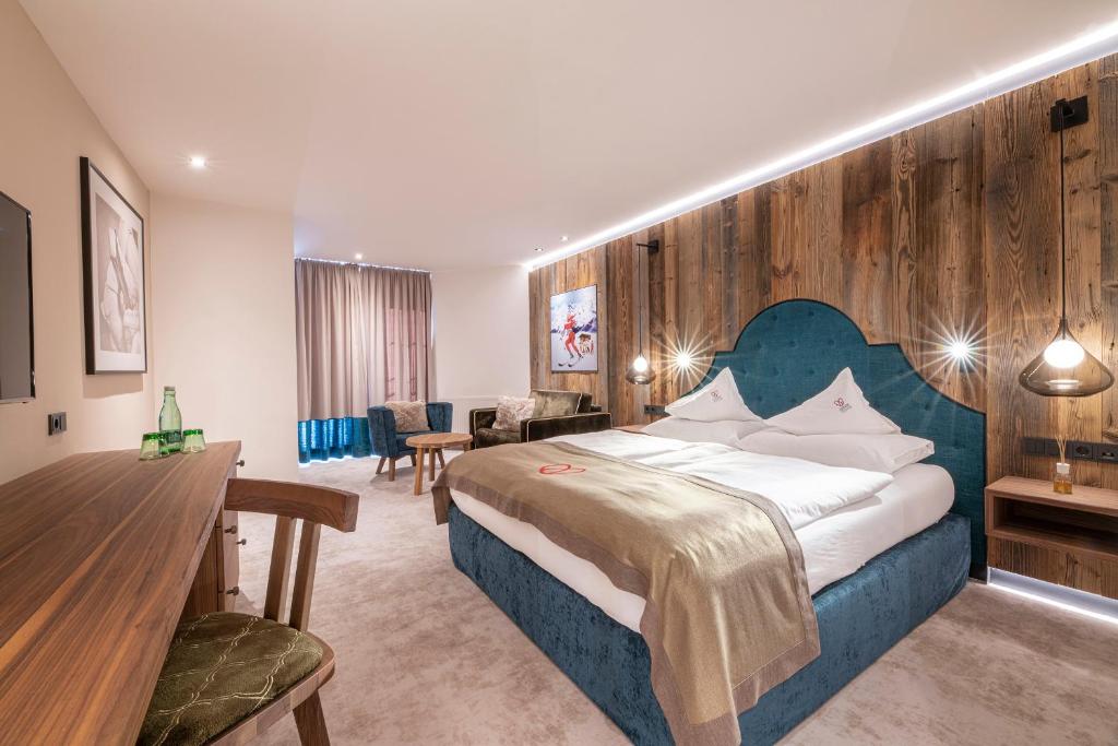 Postel nebo postele na pokoji v ubytování Superior Hotel Edelweiss