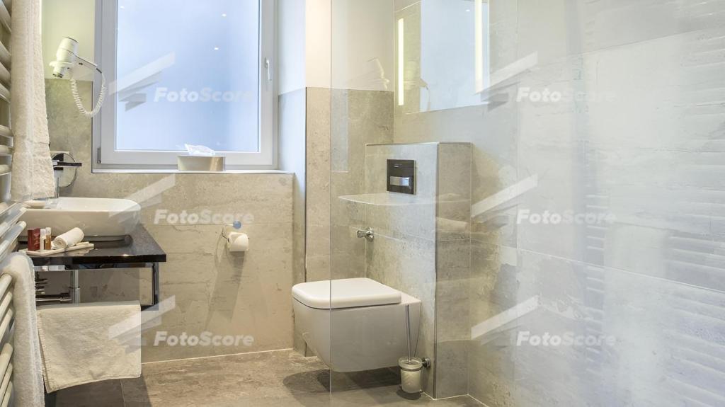 Um banheiro em Villa Westend Hotel an der Messe