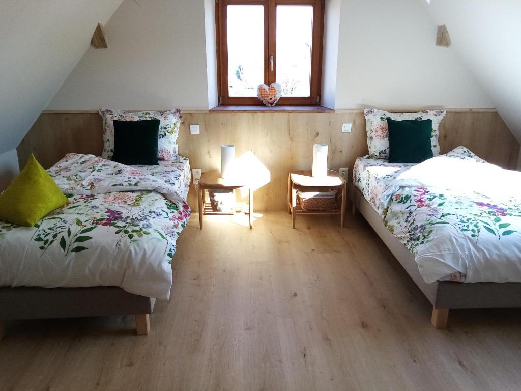 Postel nebo postele na pokoji v ubytování Hissele