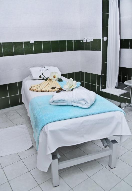 Postel nebo postele na pokoji v ubytování Wellness Hotel Ida