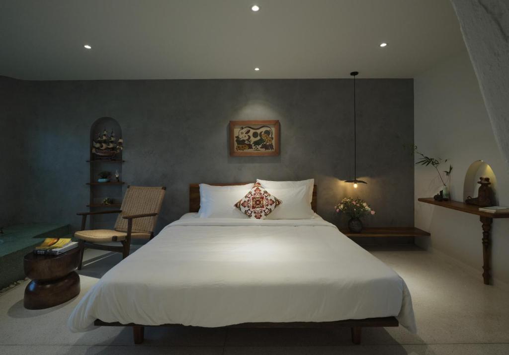Giường trong phòng chung tại Barbados Cherry Villa