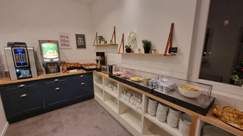 Kuchyň nebo kuchyňský kout v ubytování Oskar Hotel