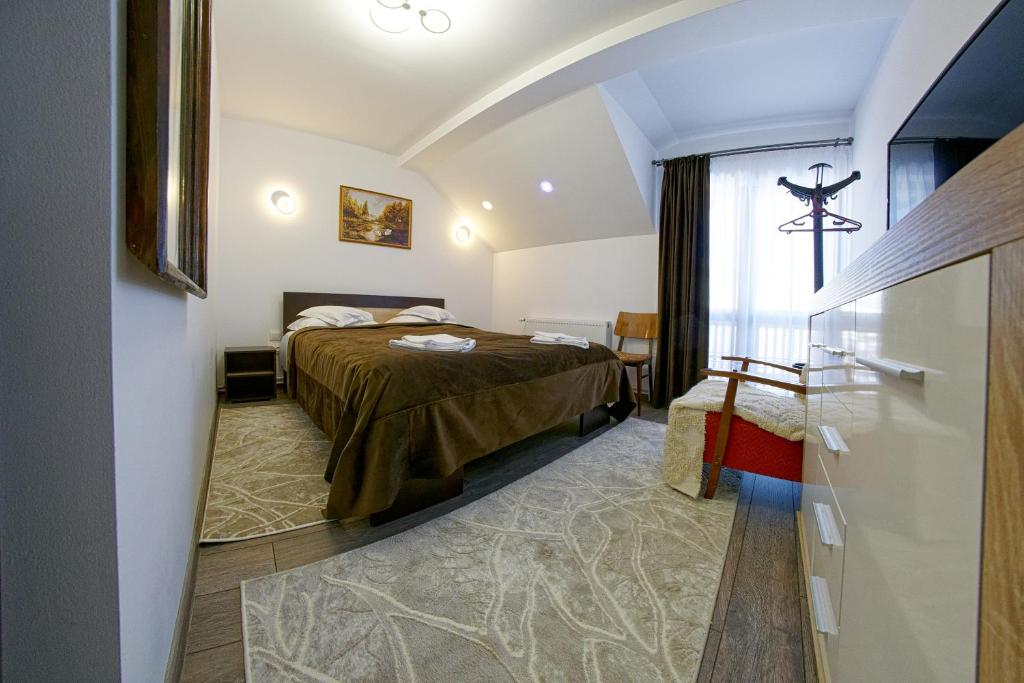 Postel nebo postele na pokoji v ubytování Casa de pe Deal