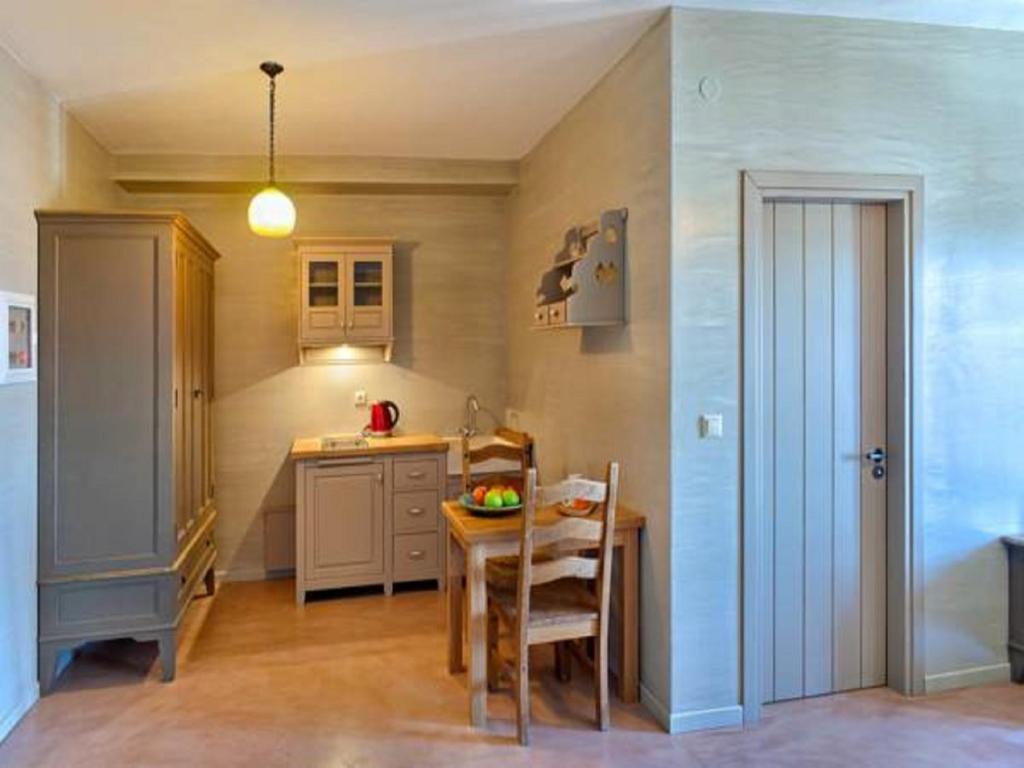 A kitchen or kitchenette at Haones Suites