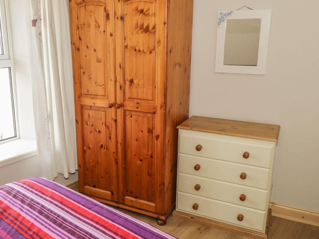 Postel nebo postele na pokoji v ubytování Glebe House