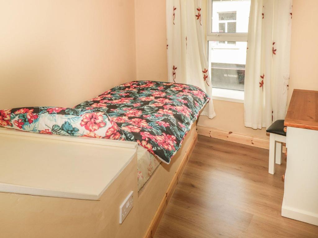 Postel nebo postele na pokoji v ubytování Glebe House
