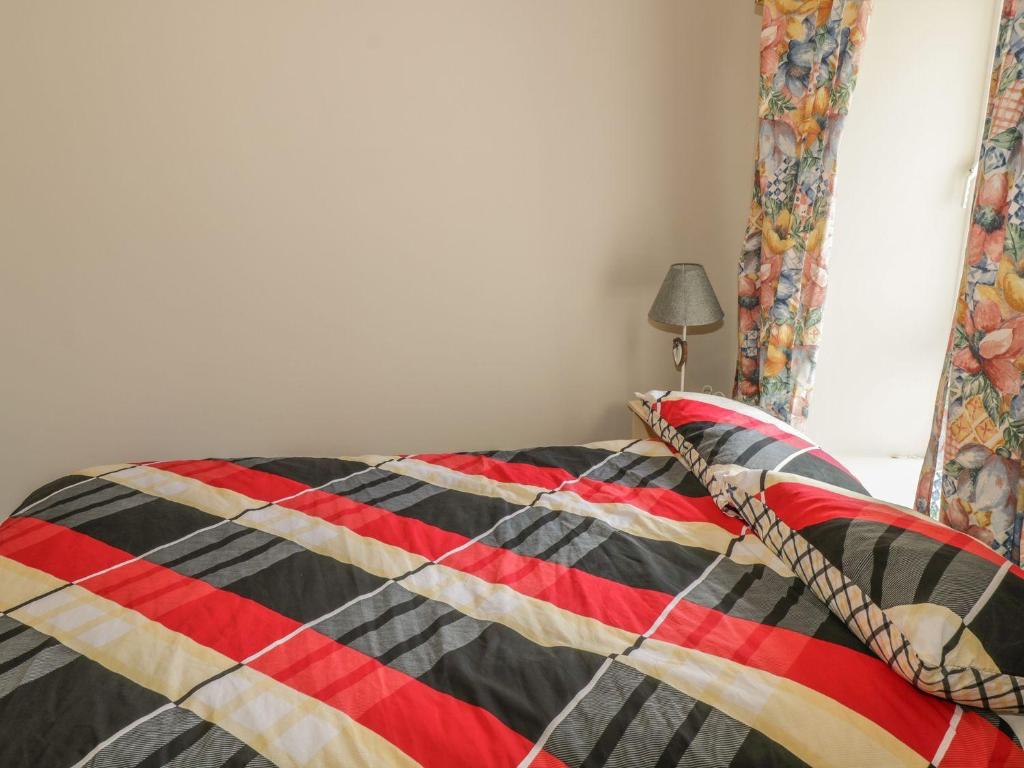 Postel nebo postele na pokoji v ubytování Glebe House