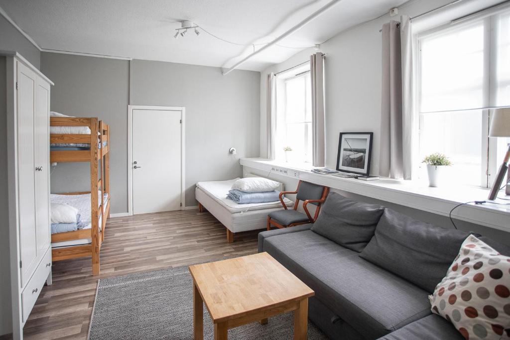 Postel nebo postele na pokoji v ubytování Vandrarhemmet Vindarnas Hus