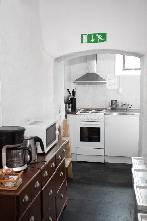 Kuchyň nebo kuchyňský kout v ubytování Vandrarhemmet Vindarnas Hus