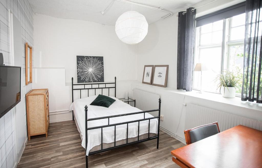 Postel nebo postele na pokoji v ubytování Vandrarhemmet Vindarnas Hus