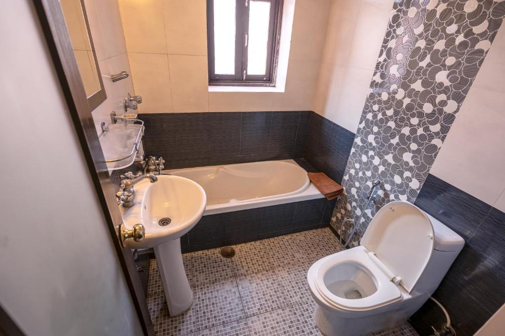 Koupelna v ubytování Hotel Ganesh Himal
