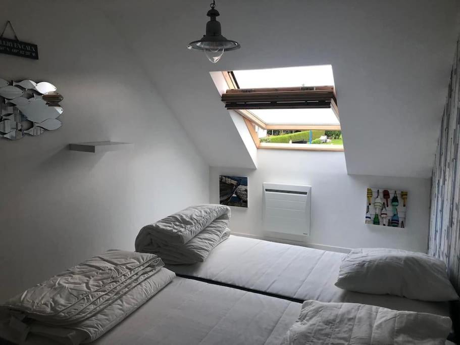 Posteľ alebo postele v izbe v ubytovaní Duplex Normandie, tout confort Saint Valery en Caux