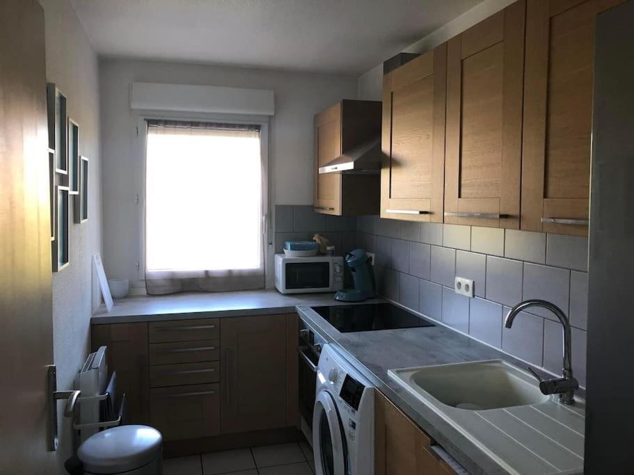 Kuchyňa alebo kuchynka v ubytovaní Duplex Normandie, tout confort Saint Valery en Caux