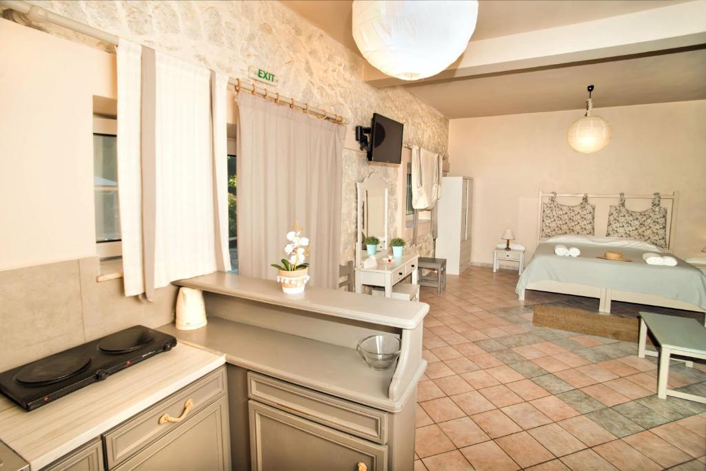 Postel nebo postele na pokoji v ubytování Paloma Luxury Studios