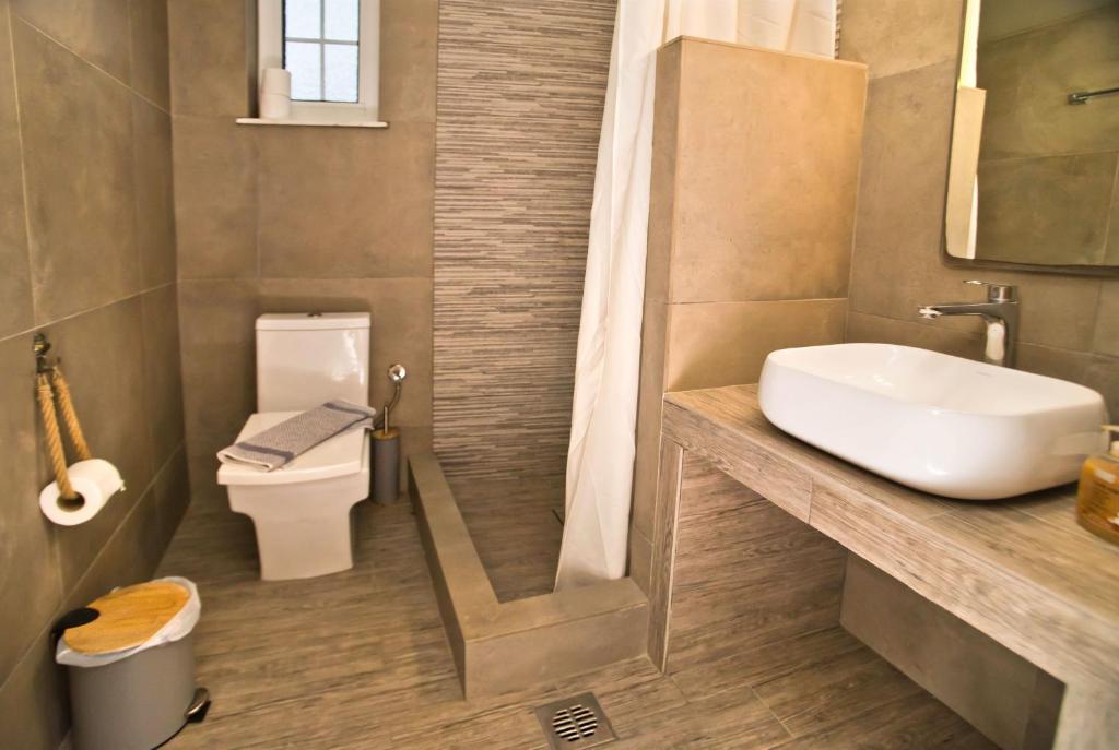 Koupelna v ubytování Paloma Luxury Studios