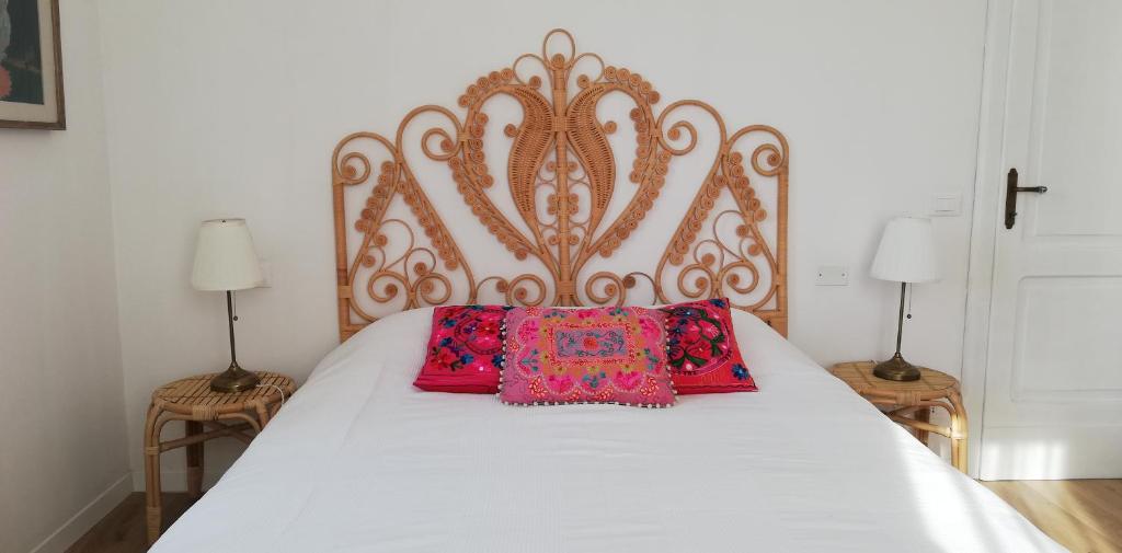 A bed or beds in a room at La mia Casa nelle Marche