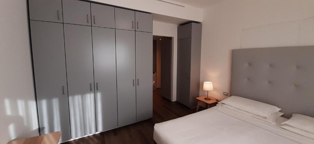 Łóżko lub łóżka w pokoju w obiekcie Delta Hotel Apartments