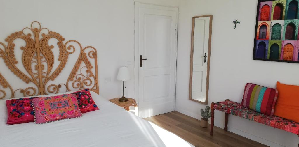 A bed or beds in a room at La mia Casa nelle Marche
