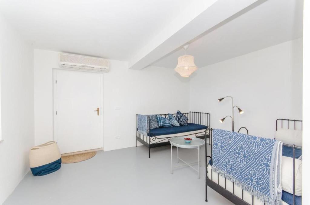 Postel nebo postele na pokoji v ubytování House Mavi