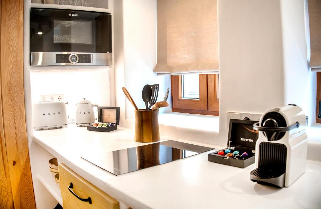 Kuchyň nebo kuchyňský kout v ubytování Villa Marineta - Apartamento con encanto en el puerto de Dénia - MyM Mediterranean Houses
