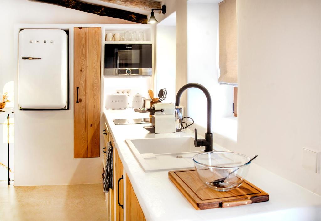 Kuchyň nebo kuchyňský kout v ubytování Villa Marineta - Apartamento con encanto en el puerto de Dénia - MyM Mediterranean Houses
