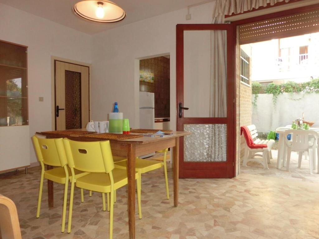 A seating area at Adorable Villa for 8 people close to the sea