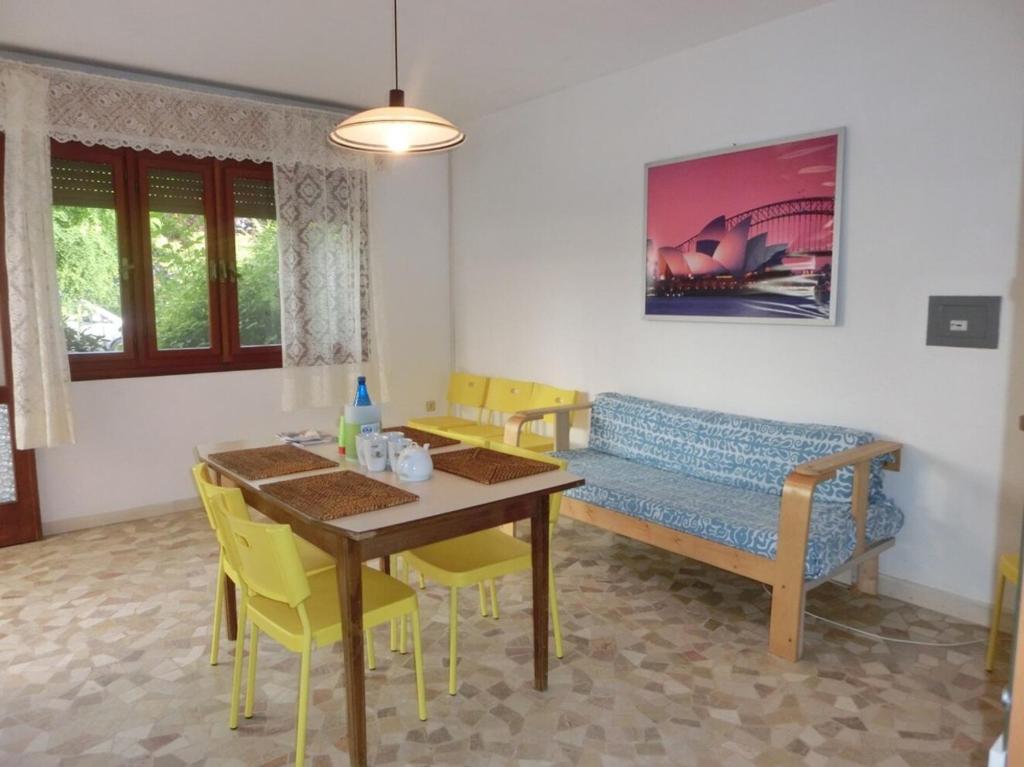 A seating area at Adorable Villa for 8 people close to the sea