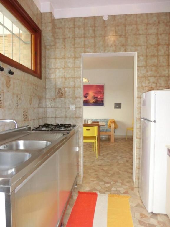 A kitchen or kitchenette at Adorable Villa for 8 people close to the sea