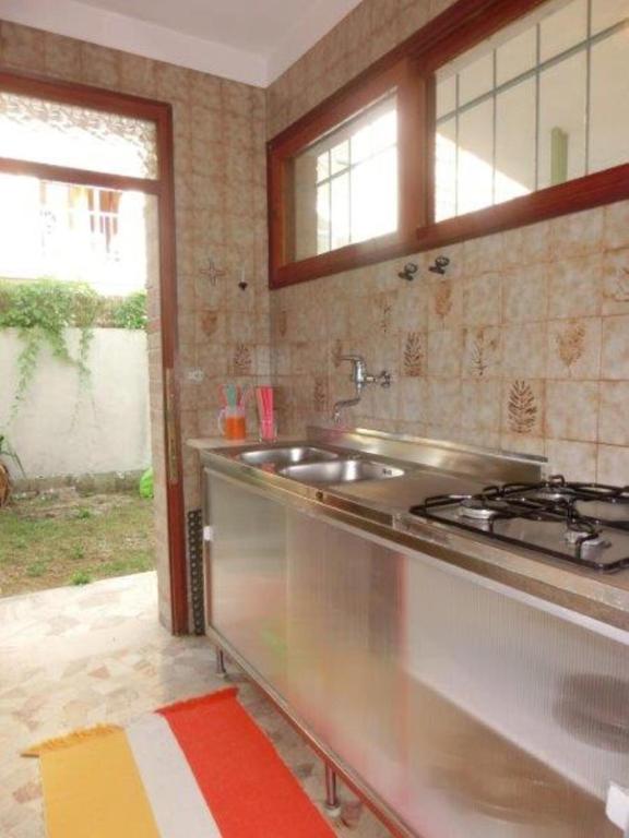 A kitchen or kitchenette at Adorable Villa for 8 people close to the sea