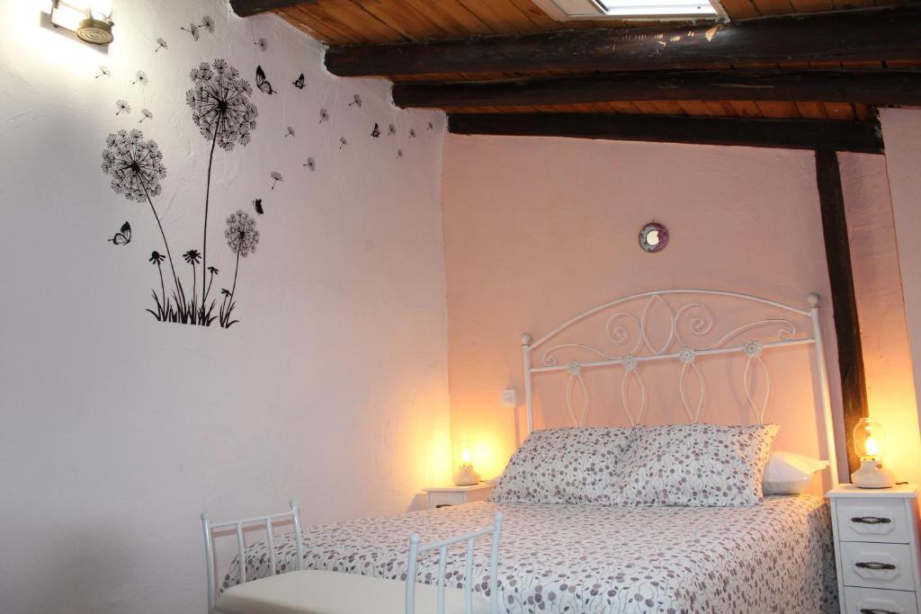 Postel nebo postele na pokoji v ubytování Casa Rural La Callejuela