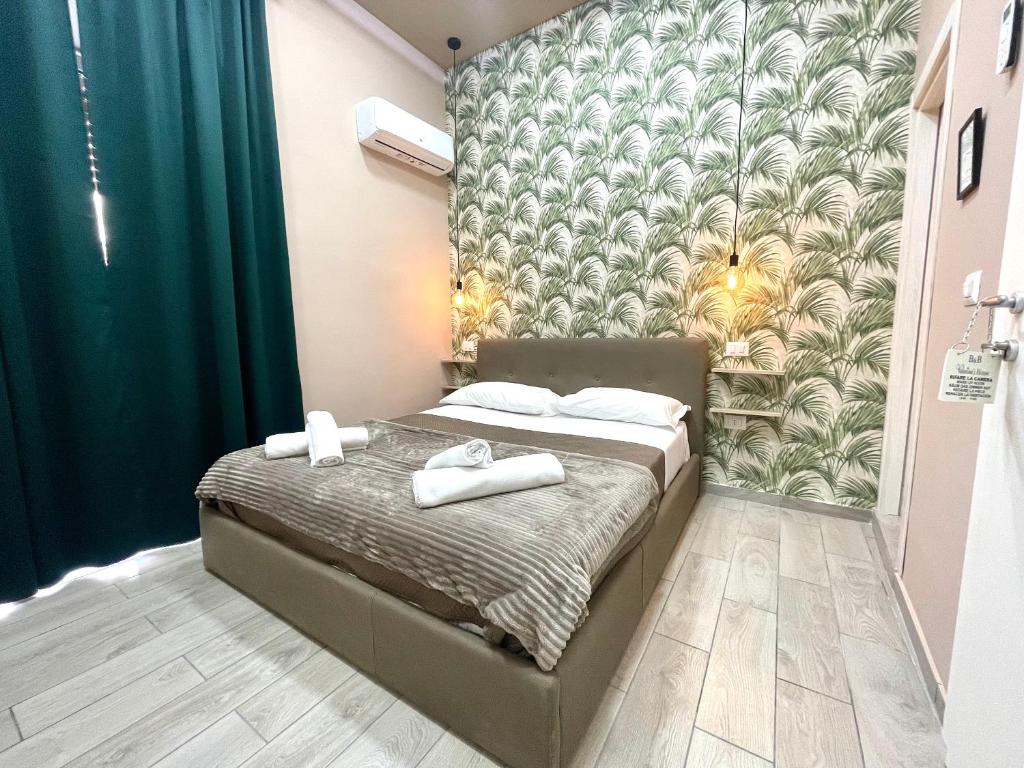 Posteľ alebo postele v izbe v ubytovaní Valentine’s house
