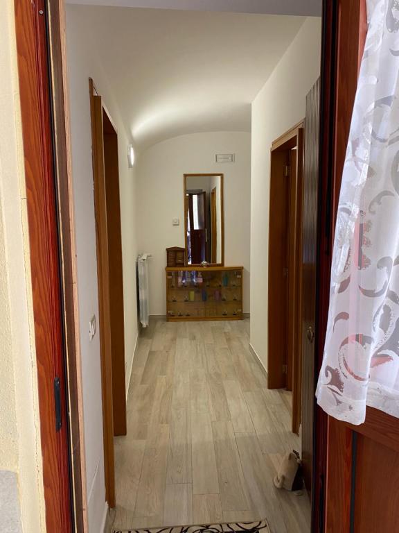 a hallway of a house with a room with at Casa Felicia in Torre Annunziata