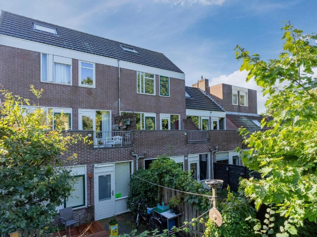 an exterior view of an apartment building at Cosy apartment in Alkmaar with balcony in Alkmaar