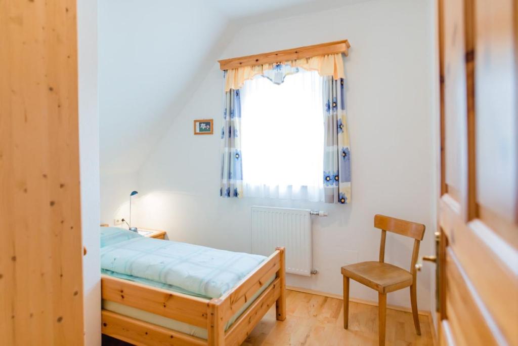 Posteľ alebo postele v izbe v ubytovaní Ferienwohnung Stiegelbauer Fichte