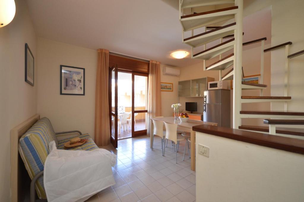 A bed or beds in a room at Villaggio Selene