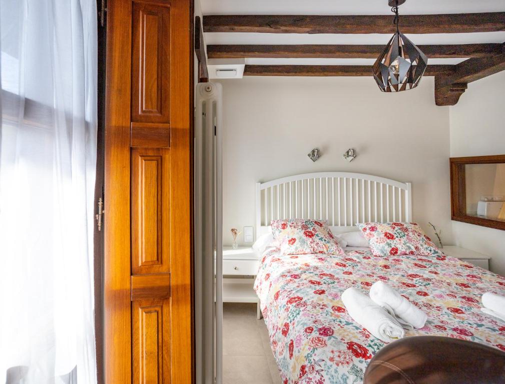 Postel nebo postele na pokoji v ubytování Apartamentos Los Edules