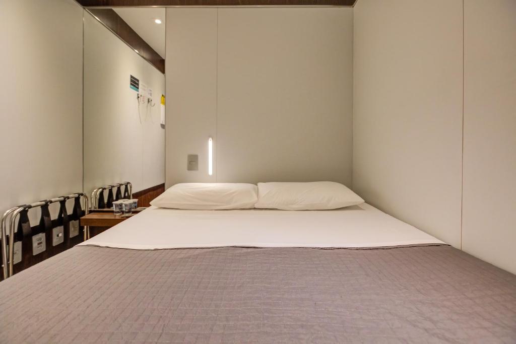FAST SLEEP Guarulhos by Slaviero Hotéisにあるベッド